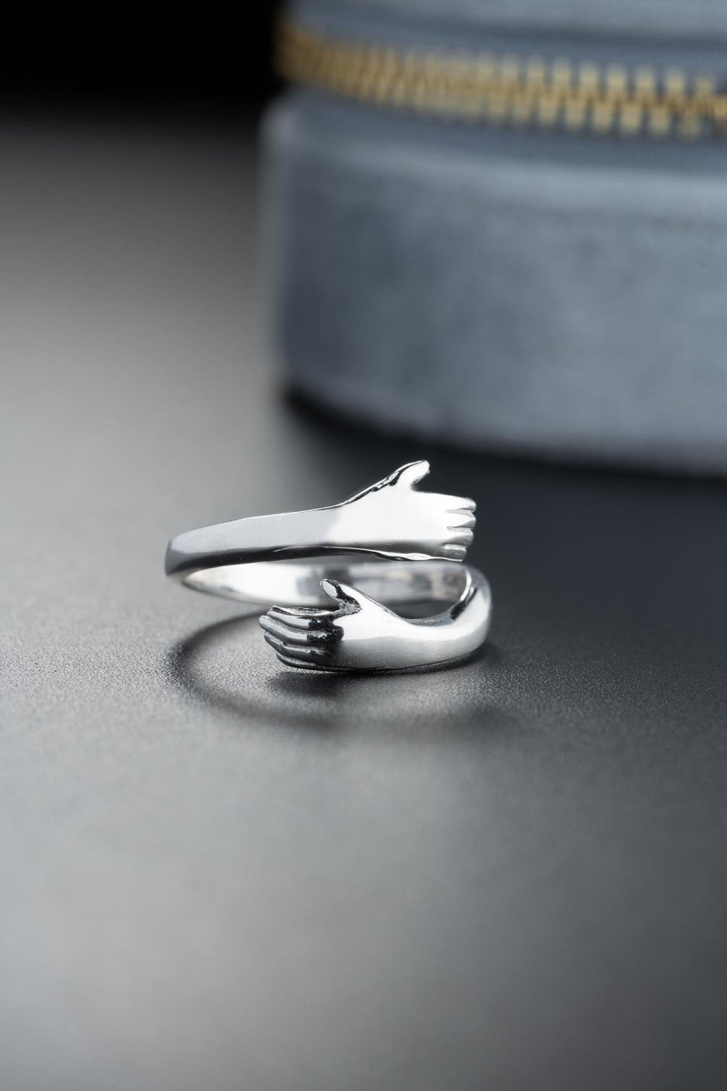 Nereze | Rhodium Plated Wrapped Hands Adjustable Size Ring - TryAladdin