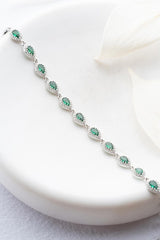 Nereze | Rhodium Plated Green Drop Zirconia Stone Bracelet - TryAladdin