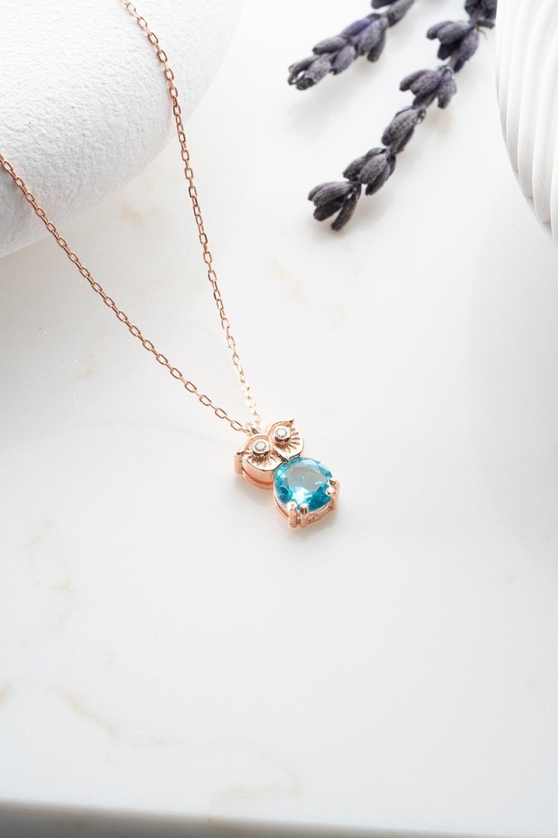 Nereze | Rose Plated Owl Necklace with Aquamarine Stone - TryAladdin