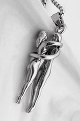 Taki | Hugging Couple Unisex Lover Stainless Steel Necklace - TryAladdin